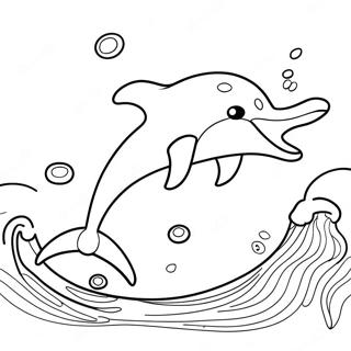 Page à colorier de dauphin joueur sautant par-dessus les vagues | Page de coloriage Dauphin Réaliste